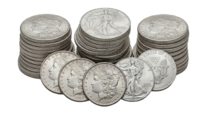 Stacks of silver bullion and Morgan dollars representing high-liquidity coin selling options.