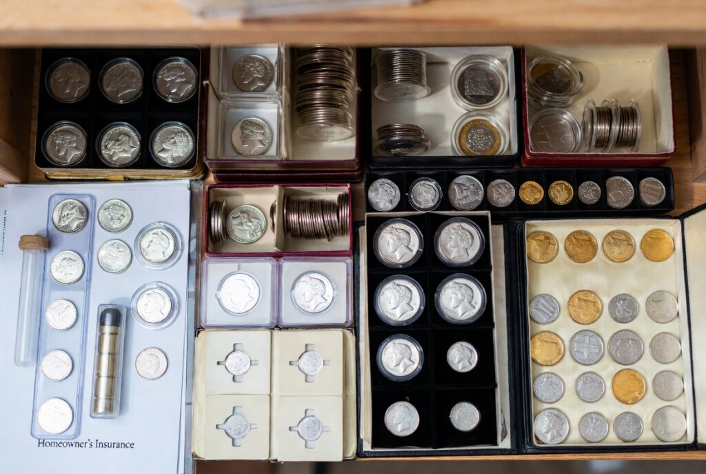 Proper safe storage of rare coins using acid-free holders and coin tubes to protect value.