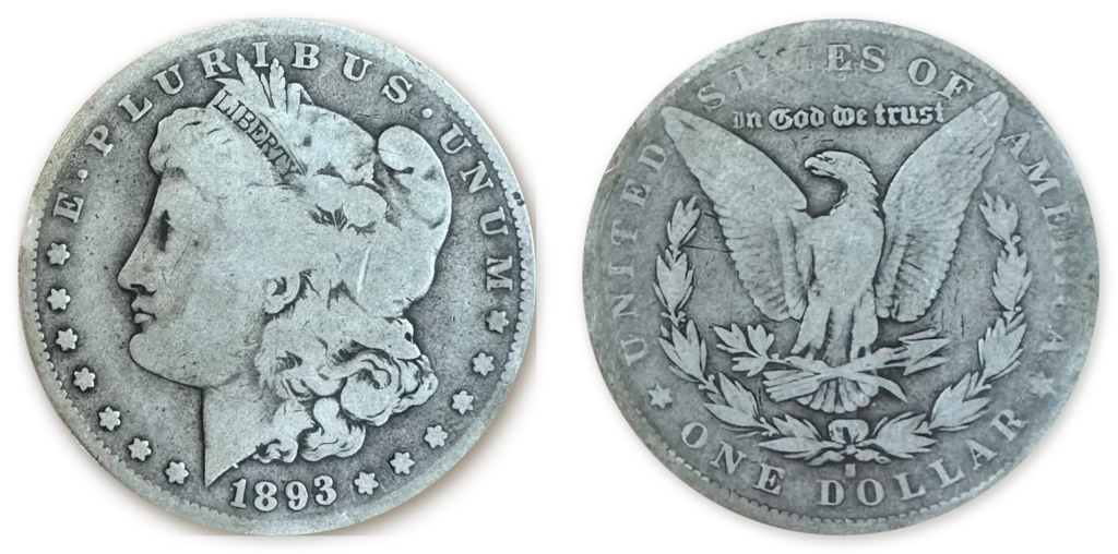 Obverse and reverse of a circulated 1893-S Morgan silver dollar, the key date of the series, at true relative size