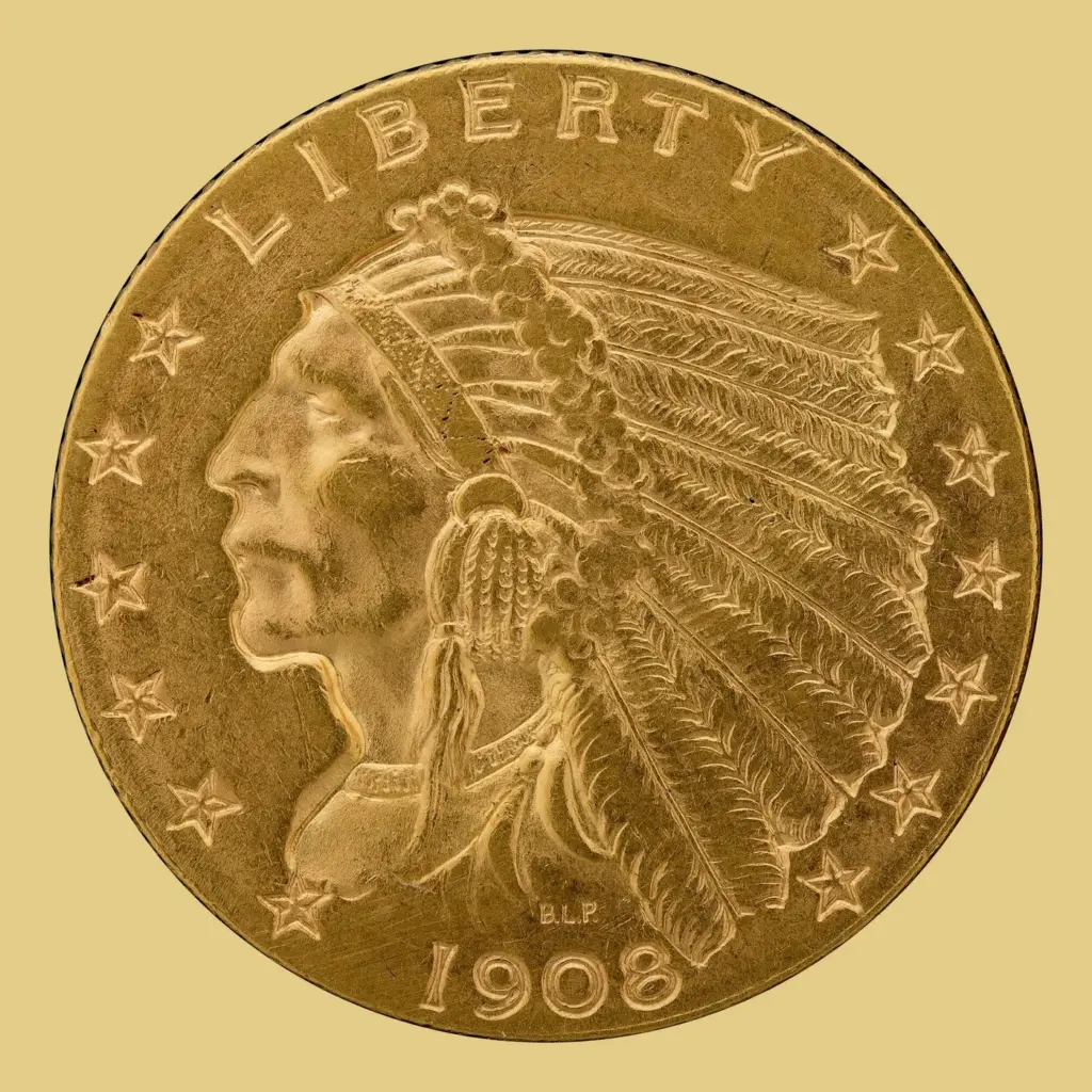 Obverse of a 1908 Indian Head $2.50 quarter eagle gold coin showing a Native American in feathered headdress with LIBERTY and stars, on a gold background