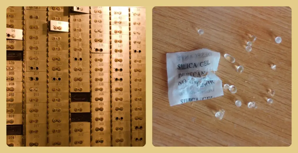 A wall of bank safe deposit boxes beside an open packet of silica gel desiccant beads