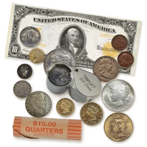A chrome jeweler's loupe magnifying the 1921 date on a Morgan silver dollar, among classic U.S. gold, silver and copper coins, a wrapped roll of quarters and a 1907 $10 gold certificate