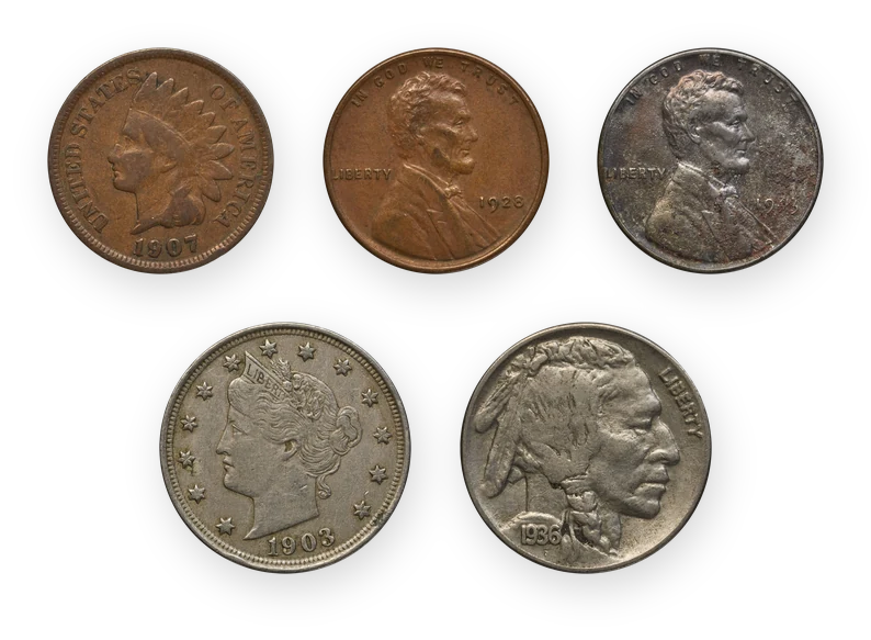 Three old U.S. cents above two old nickels at true relative size: a 1907 Indian Head cent, a 1928 Lincoln wheat cent, a 1943 zinc-coated steel cent, a 1903 Liberty Head nickel and a 1936 Buffalo nickel