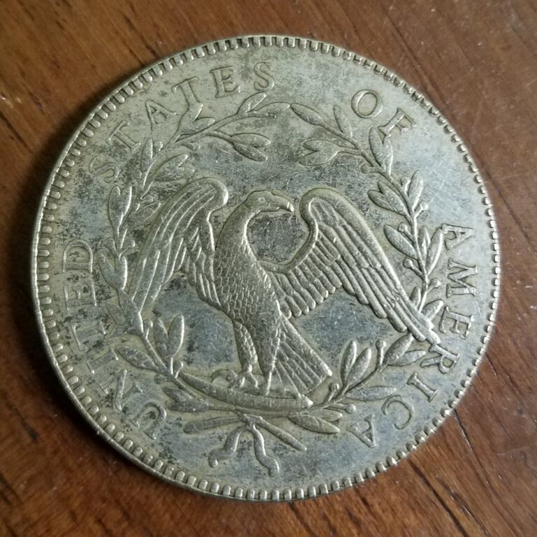 Counterfeit 1794 Flowing Hair silver dollar, reverse with eagle and wreath