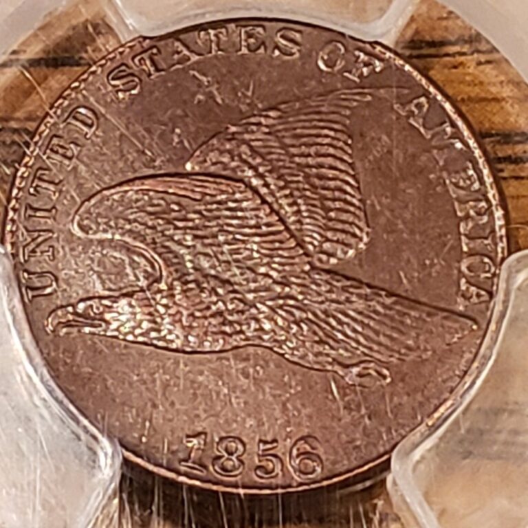Counterfeit 1856 Flying Eagle cent from a fake PCGS holder, obverse close-up