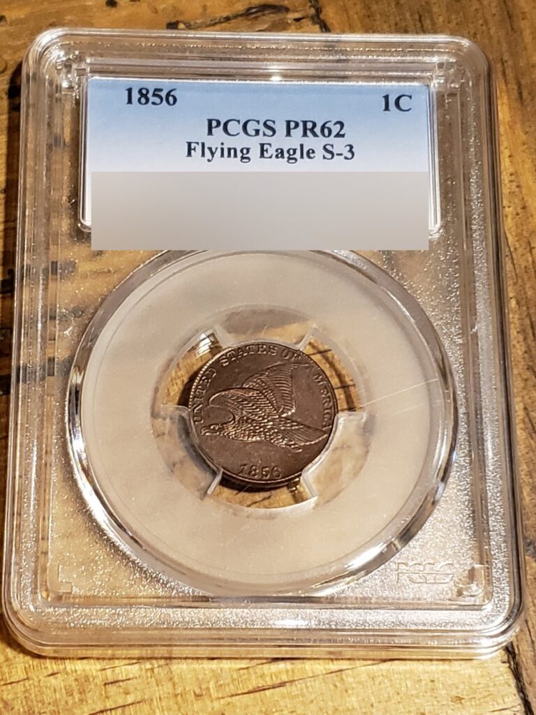 Fake 1856 Flying Eagle cent in a PCGS branded holder labeled PR62