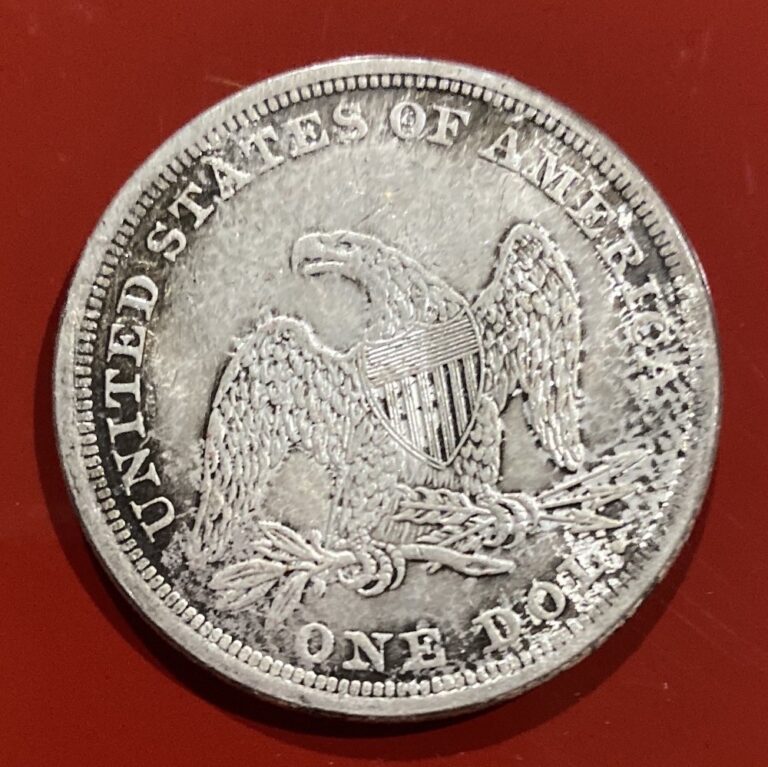 Counterfeit 1862 Seated Liberty silver dollar, reverse