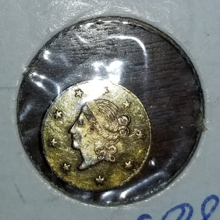 Fake 1865 California fractional gold half dollar in a 2x2 flip, obverse