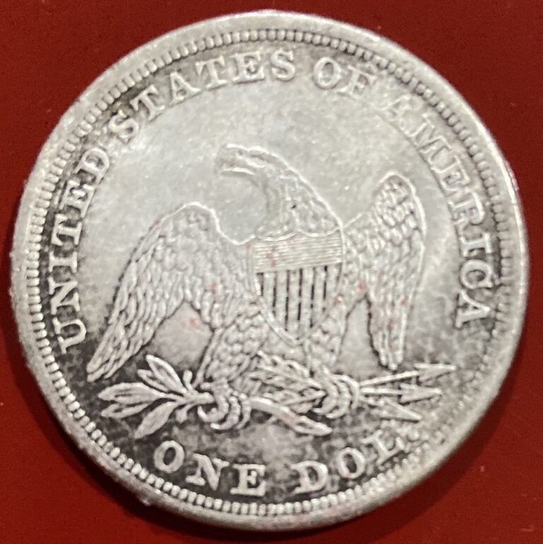 Fake trade dollar reverse showing a Seated Liberty ONE DOL. eagle instead of TRADE DOLLAR