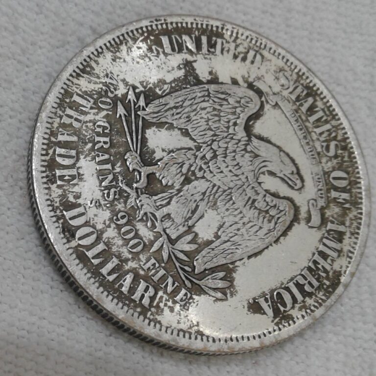Counterfeit 1885 trade dollar, reverse