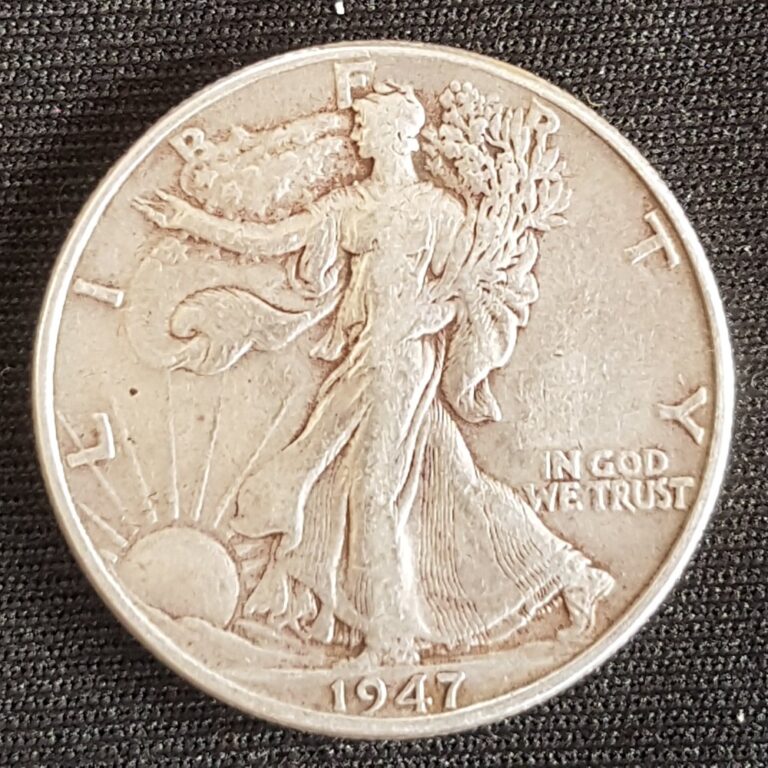 Counterfeit 1947 Walking Liberty half dollar, date close-up