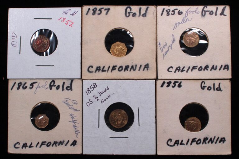 Group of six fake California fractional gold coins in cardboard holders
