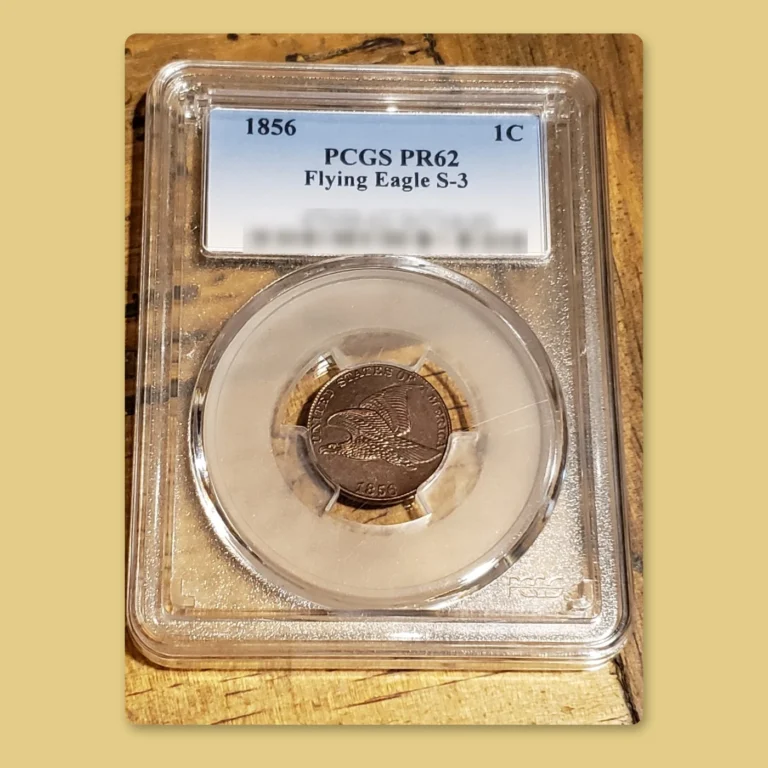 Counterfeit PCGS holder labeled 1856 1C PCGS PR62 Flying Eagle S-3 containing a fake 1856 Flying Eagle cent, with the certification number blurred