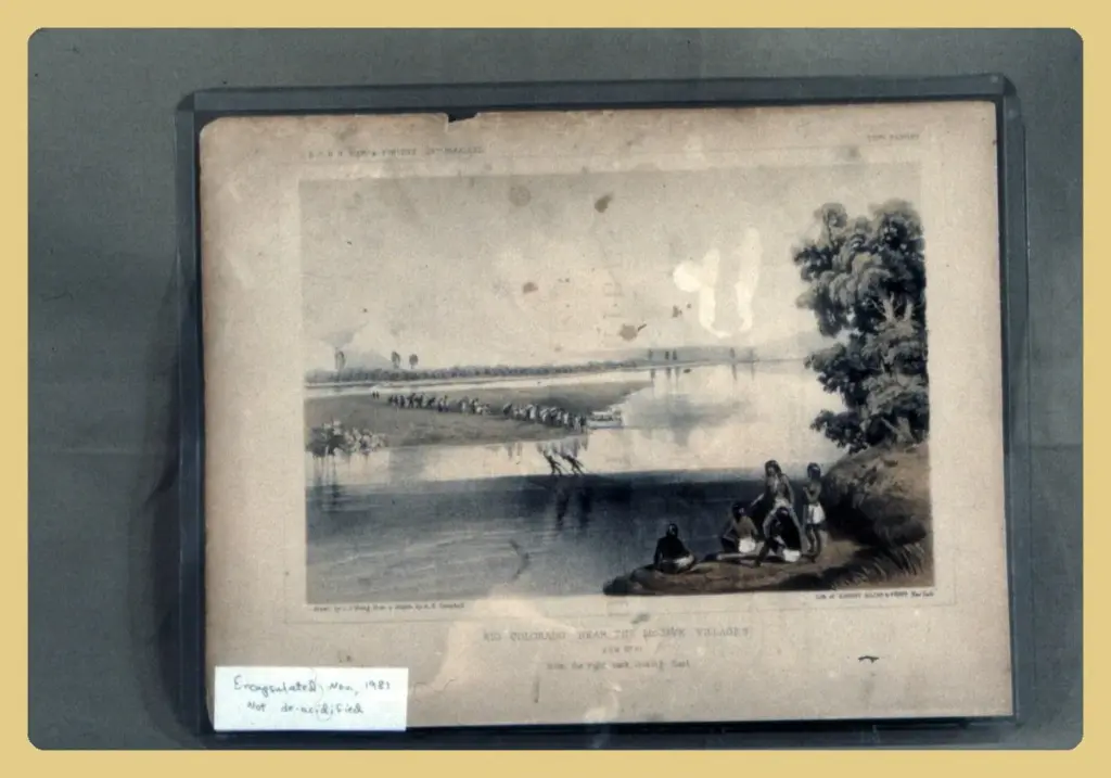 An antique printed engraving with foxing sealed inside a clear archival polyester sleeve