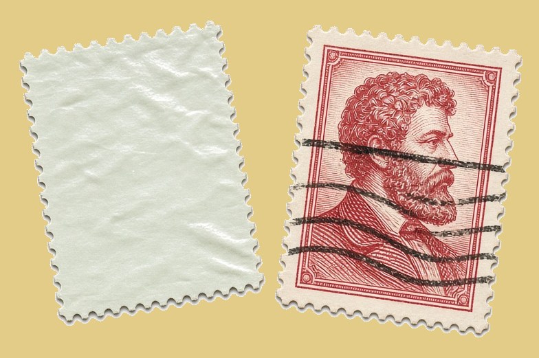 Back of a stamp showing its gum next to a used red portrait stamp with heavy wavy-line cancellation