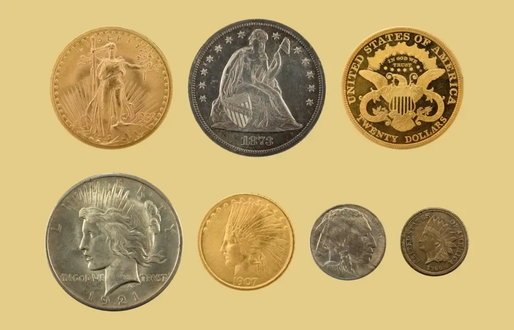 Saint-Gaudens double eagle, Seated Liberty dollar, Liberty double eagle reverse, Peace dollar, Indian Head eagle, Buffalo nickel and Indian Head cent on a gold background