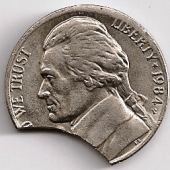 example of a jefferson nickel with a clipped planchet mint error