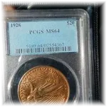 A counterfeit 1928 Saint-Gaudens gold coin in a fake PCGS slab, an example of sophisticated counterfeit coins.