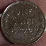 The reverse of a faked Lincoln cent, showing how altered and counterfeit coins can be deceptive.