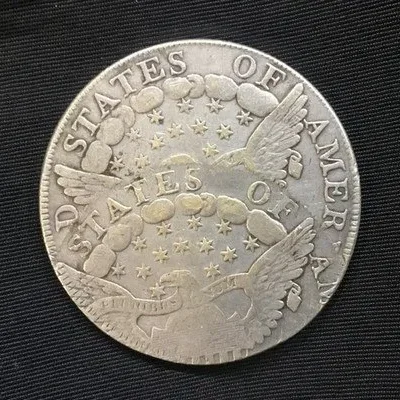 The reverse of a fake 1802 Bust silver half, an example of a counterfeit coin that requires expert authentication.