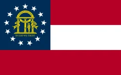 The Georgia state flag, representing our service as a trusted Georgia coin dealer.