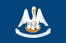 The Louisiana state flag, representing our service as a trusted Louisiana coin dealer.