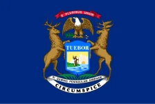 The Michigan state flag, representing our service as a trusted Michigan coin dealer.