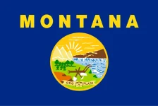 The Montana state flag, representing our service as a trusted Montana coin dealer.