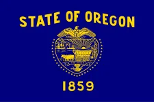 The Oregon state flag, representing our service as a trusted Oregon coin dealer.